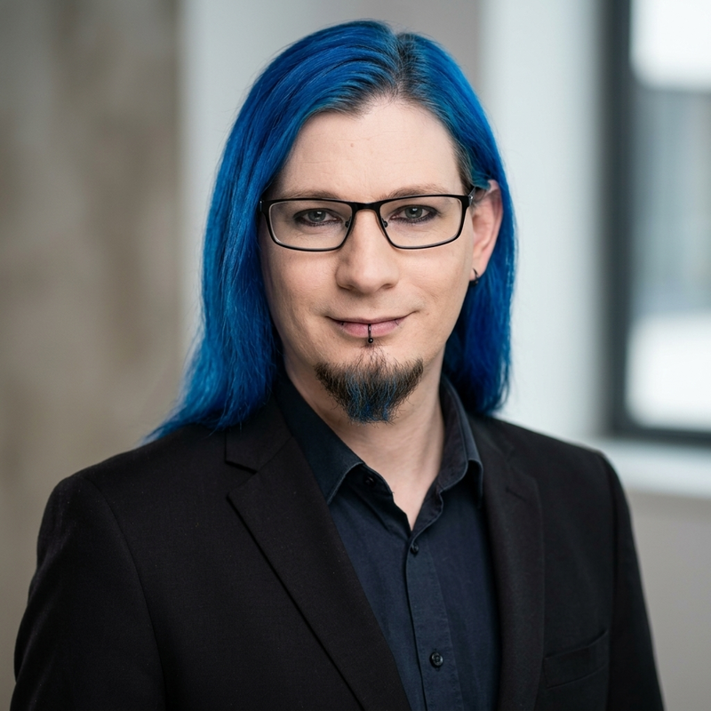 A professional photo of the Founder & Creator, James Groves